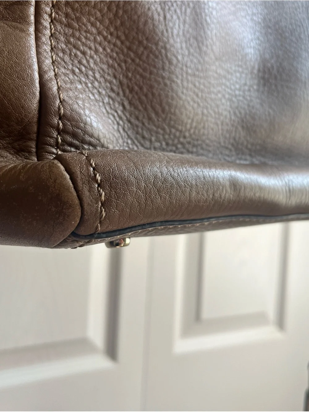 Kate Spade New York brown purse with handles strap buckle